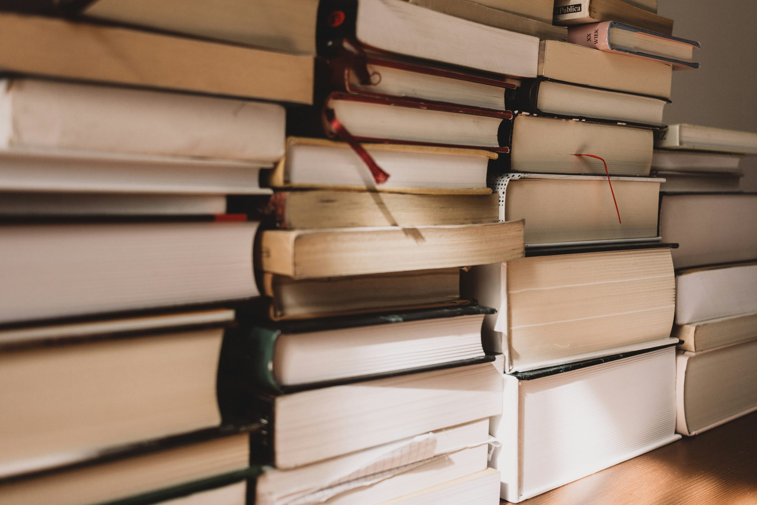 Stacks of books with pages facing out